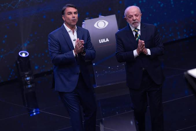 Primeiro confronto direto entre Lula e Flávio Bolsonaro.